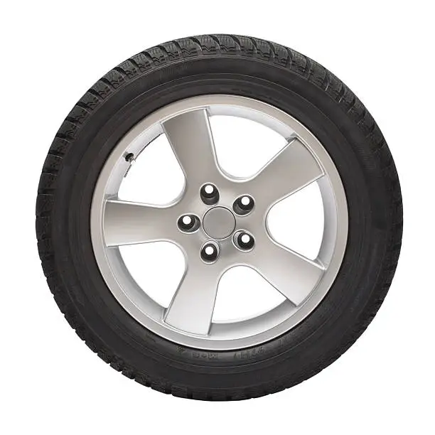 .Brand new winter tire  with wheel (clipping path).