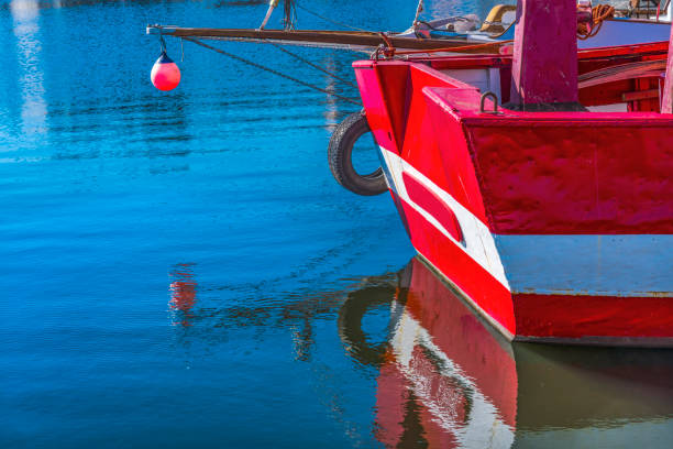 fishing boat waiting on the beach for high tide : Hua Hin  Thailand