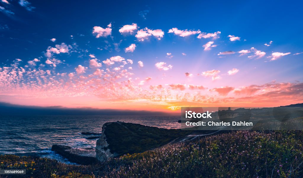 California Cliff Sunset Sunset over California cliffs Davenport - California Stock Photo