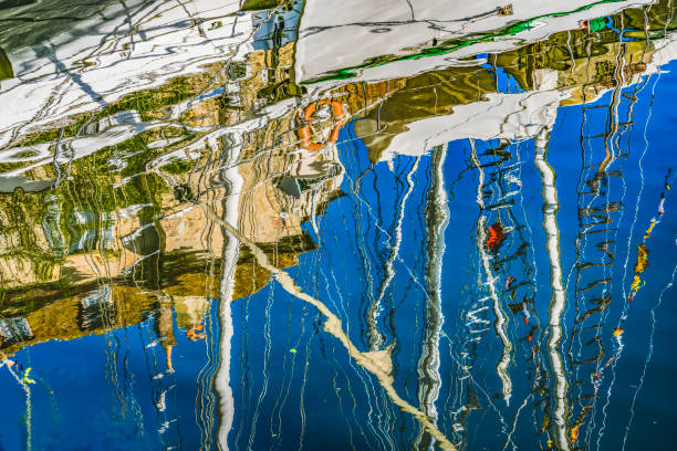 istock White Sailboats Waterfront Reflection Abstract Inner Harbor Honfluer France 1351692801