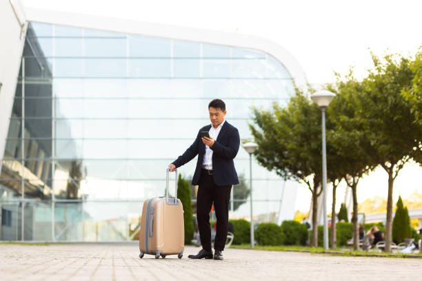 istock Businessman corresponded in a mobile phone uses the messenger application to communicate with colleagues at a distance 1351692817