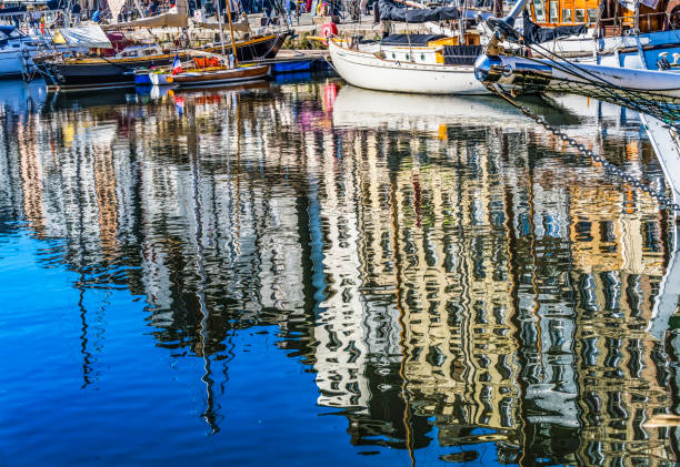istock Yachts Boats Waterfront Reflection Inner Harbor Honfluer France 1351693064
