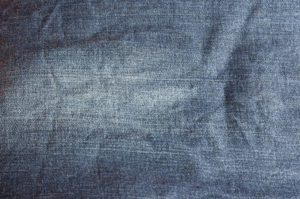 istock The texture of crumpled denim. 1351696711