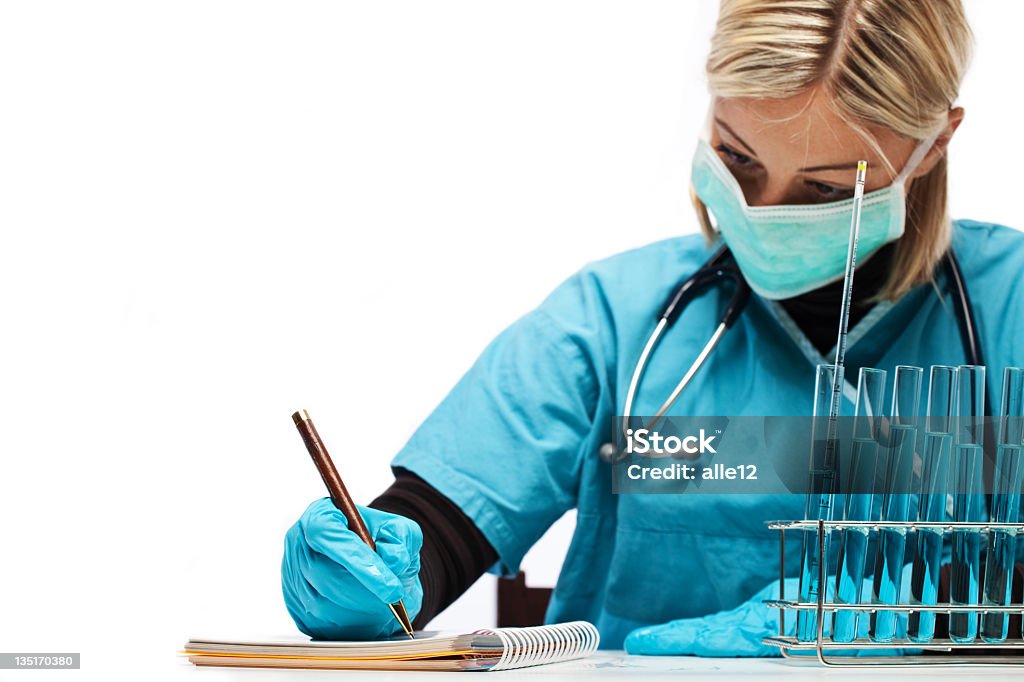 Woman at work in lab Close up of a young blond woman  Adult Stock Photo