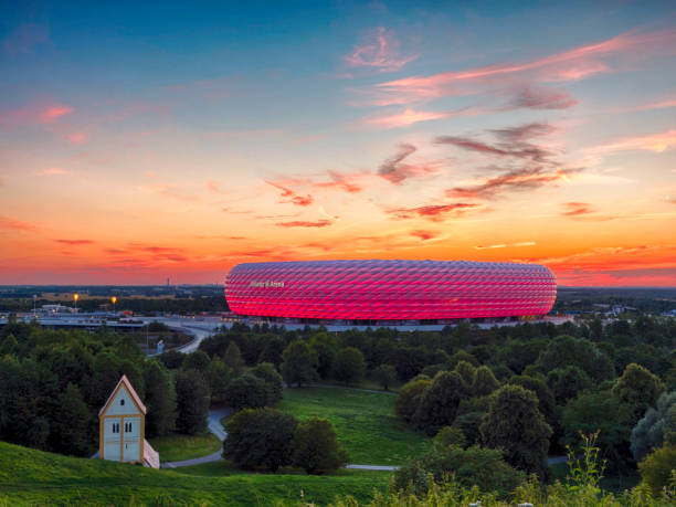 Allianz Arena, illuminated, Munich, Bavaria Famous football stadium Allianz Arena in Munich, Bavaria, Germany, Europe allianz arena stock pictures, royalty-free photos & images