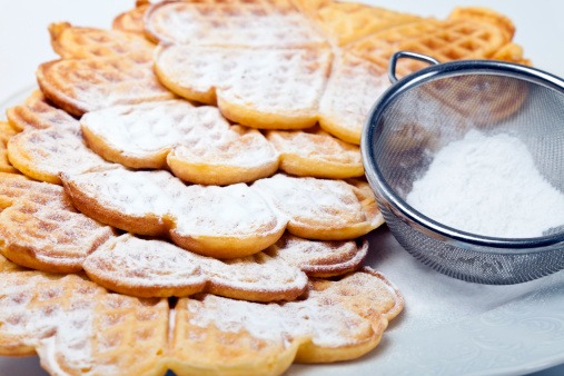 Waffles with powdered sugar. 