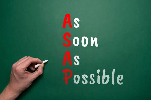 Photo of ASAP or As Soon As Possible this is a business acronym. Hand draws text with chalk