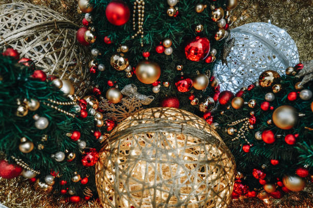 istock Golden red Christmas decorations and spruce branches. Festive mood. 1351710346