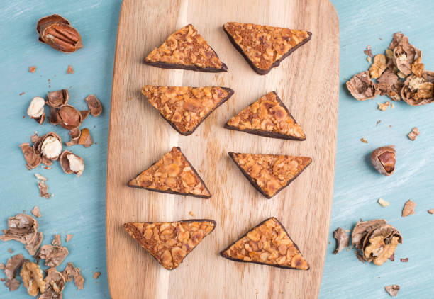 istock Nut corner, traditional german sweets called Nussecke, covered with chocolate 1351713064