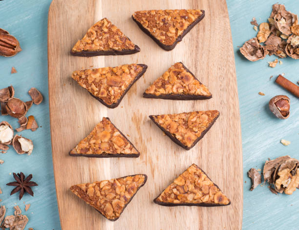 istock Nut corner, traditional german sweets called Nussecke, covered with chocolate 1351714348