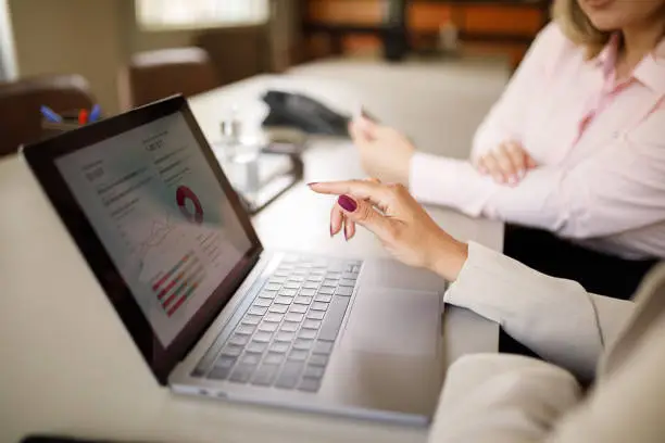 Woman working as financial advisor and receiving clients