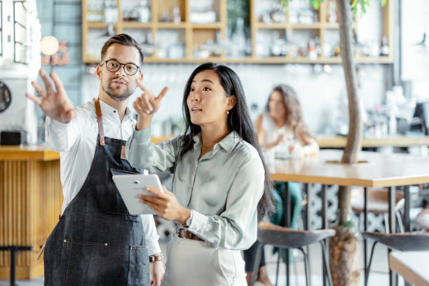 Waiter and Manager in a Coffee Shop