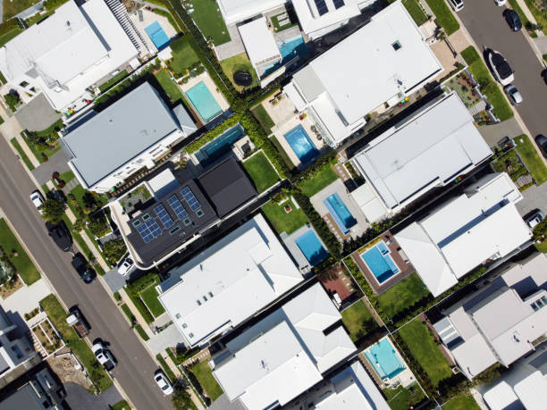 istock Rooftops of new modern suburb, high angle view, background with copy space 1351719049