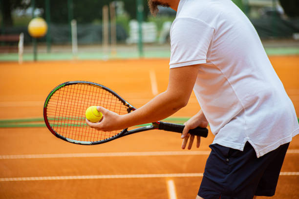 istock Professional male tennis player ready for a serve 1351720070