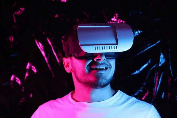 Photo of Man wearing VR Glasses