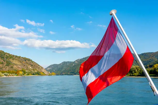 Flag of Austria and Danube river in Wachau valley