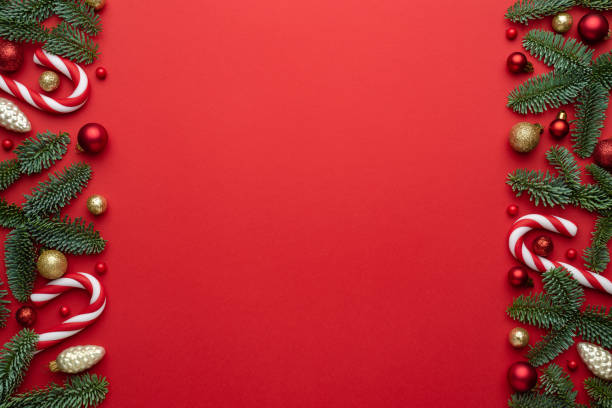 istock Red background with christmas decorations 1351728544