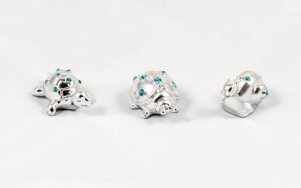 istock Ornamental silver snail, ladybird and turtle with gemstones 1351729862