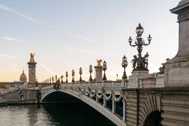 istock Sunset on Alexandre III bridge and Les Invalides in background 1351739241
