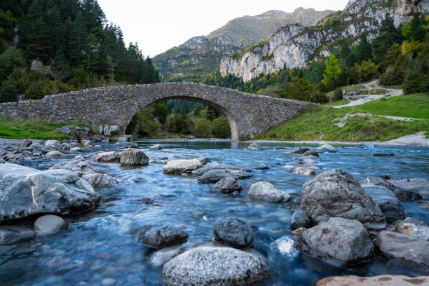 istock San Nicolas romanesque bridge Ara river Bujaruelo, Ordesa Huesca 1351744550