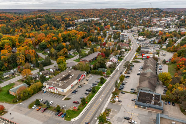 Huntsville Townscape and Fairy Lake at Fall, Ontario, Canada Aerial Huntsville Townscape at Fall, Ontario, Canada. huntsville ontario stock pictures, royalty-free photos & images