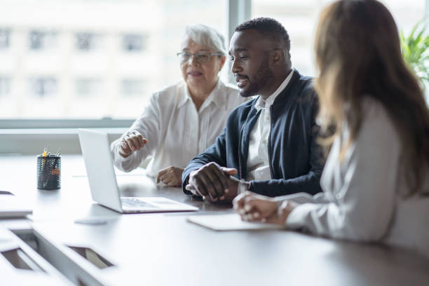 istock Business people engaged in discussion 1351745777