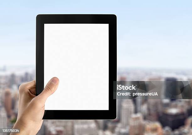 Hand Holds Blank Tablet Pc Stock Photo - Download Image Now - Blank, City, Digital Tablet