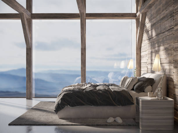 istock Wooden cabin bedroom with a view 1351751408