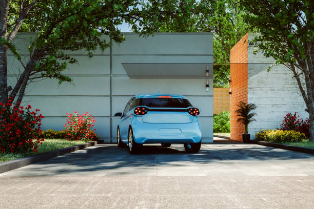istock Modern house driveway with parked car 1351751562