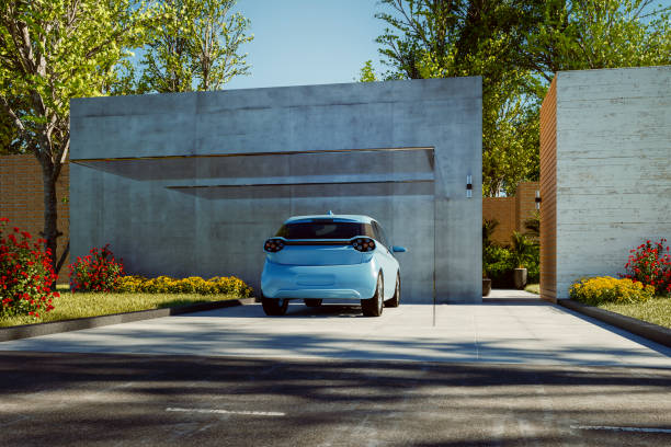 istock Modern house driveway with parked car 1351751579