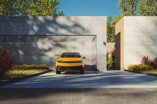 Modern house driveway with parked car. Generic vehicle is custom modeled and not based on any real or concept model/brand.