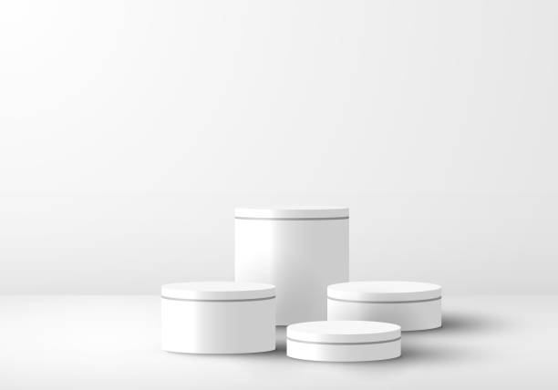 istock 3D realistic white cylinder podium pedestal with light on clean studio room background 1351757609