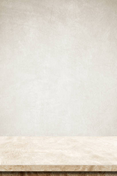 Empty brown cement table over cementwall background, banner, table top, shelf, counter design for product display montage