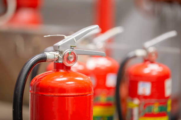 istock The red fire extinguisher is in the building for fire prevention and safety. 1351772841
