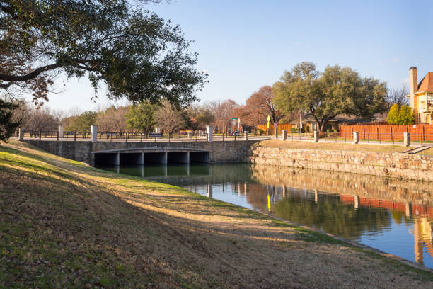 istock Bridge over the water channel in urban area 1351777544