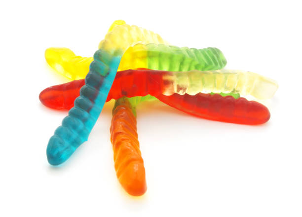 istock Gummy worms candies isolated on white 1351778637