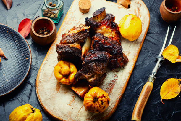 istock Delicious beef ribs fried with fruit 1351786930
