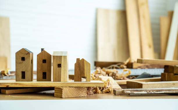 istock DIY project at home concept, House made of wood with craft tools on workbench.Table for making handmade wood work at carpenter's home. 1351797763