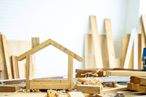 istock DIY project at home concept, House made of wood with craft tools on workbench.Table for making handmade wood work at carpenter's home. 1351797772
