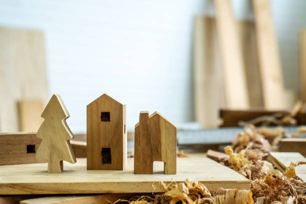 istock DIY project at home concept, House made of wood with craft tools on workbench.Table for making handmade wood work at carpenter's home. 1351797780