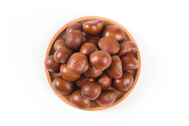 istock Close-up Chestnuts isolated on white background. 1351801817