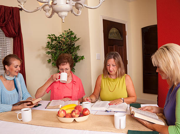 istock Ladies Bible Study at dining table in home 135180351