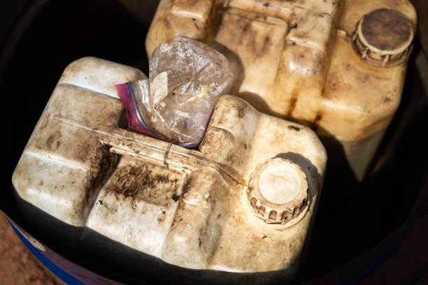 istock A dirty plastic chemical or engine oil gallon. 1351804349