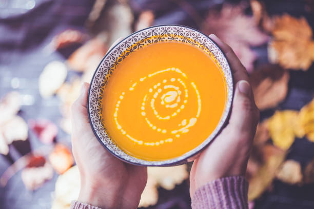 Bowl of pumpkin soup stock photo