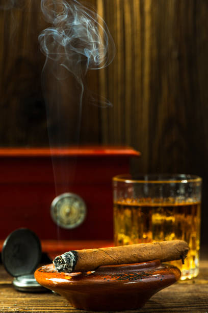 istock Traditional Cohiba Cuban Cigar on Wooden Table 1351806170