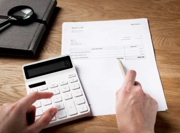 istock Business document, paper invoice with word Total and calculator 1351815014