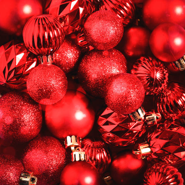 istock Background with beautiful red small decorative balls on a red background. Top view, flat lay. 1351816232