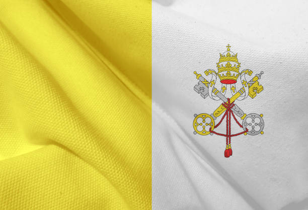 istock Closeup of grunge Vatican flag 1351819940