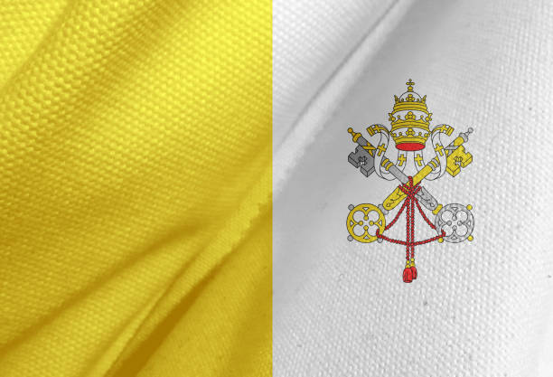 istock Closeup of grunge Vatican flag 1351820021