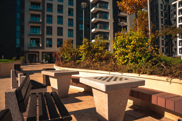Concrete chess tables in a residential district park in Belgrade, Serbia stock photo